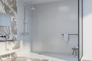 This image features a white curbless shower. 